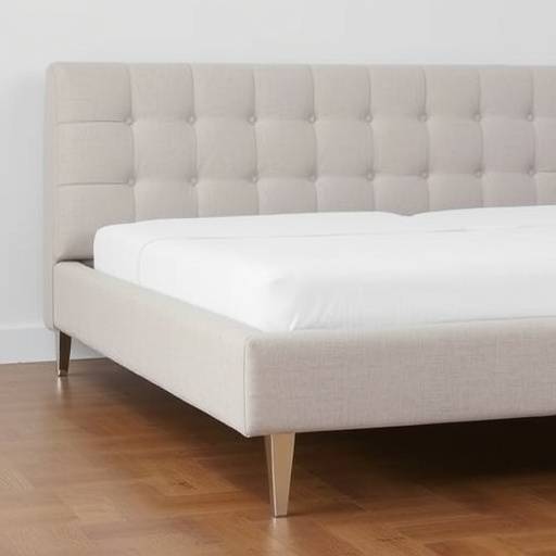 Upholstered bed with a channel-tufted headboard and metal legs